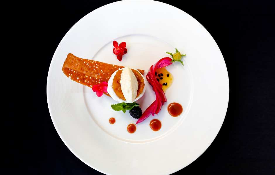 Elegant plated dessert with artistic presentation